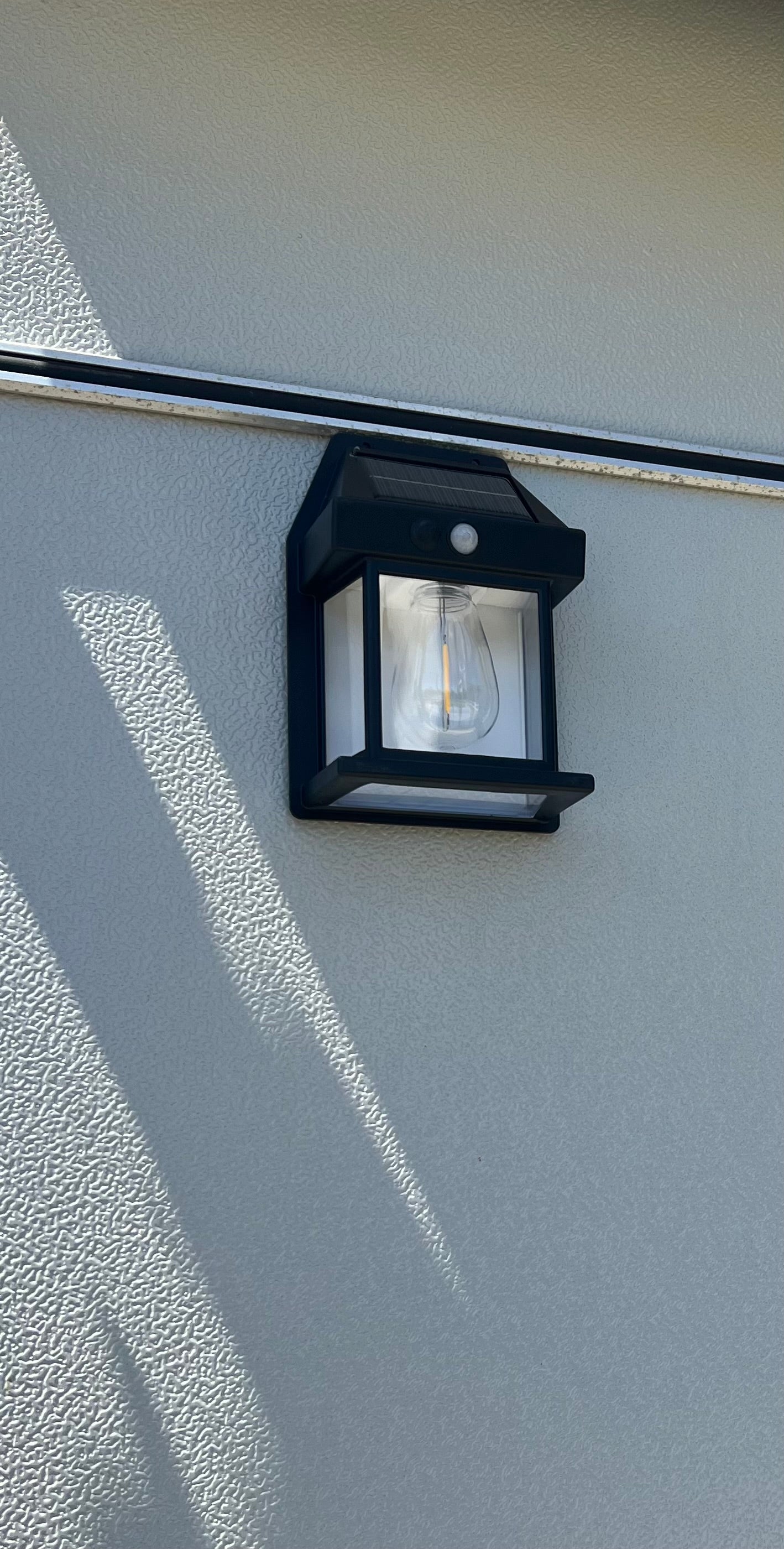 SOLAR POWERED OUTDOOR LIGHT