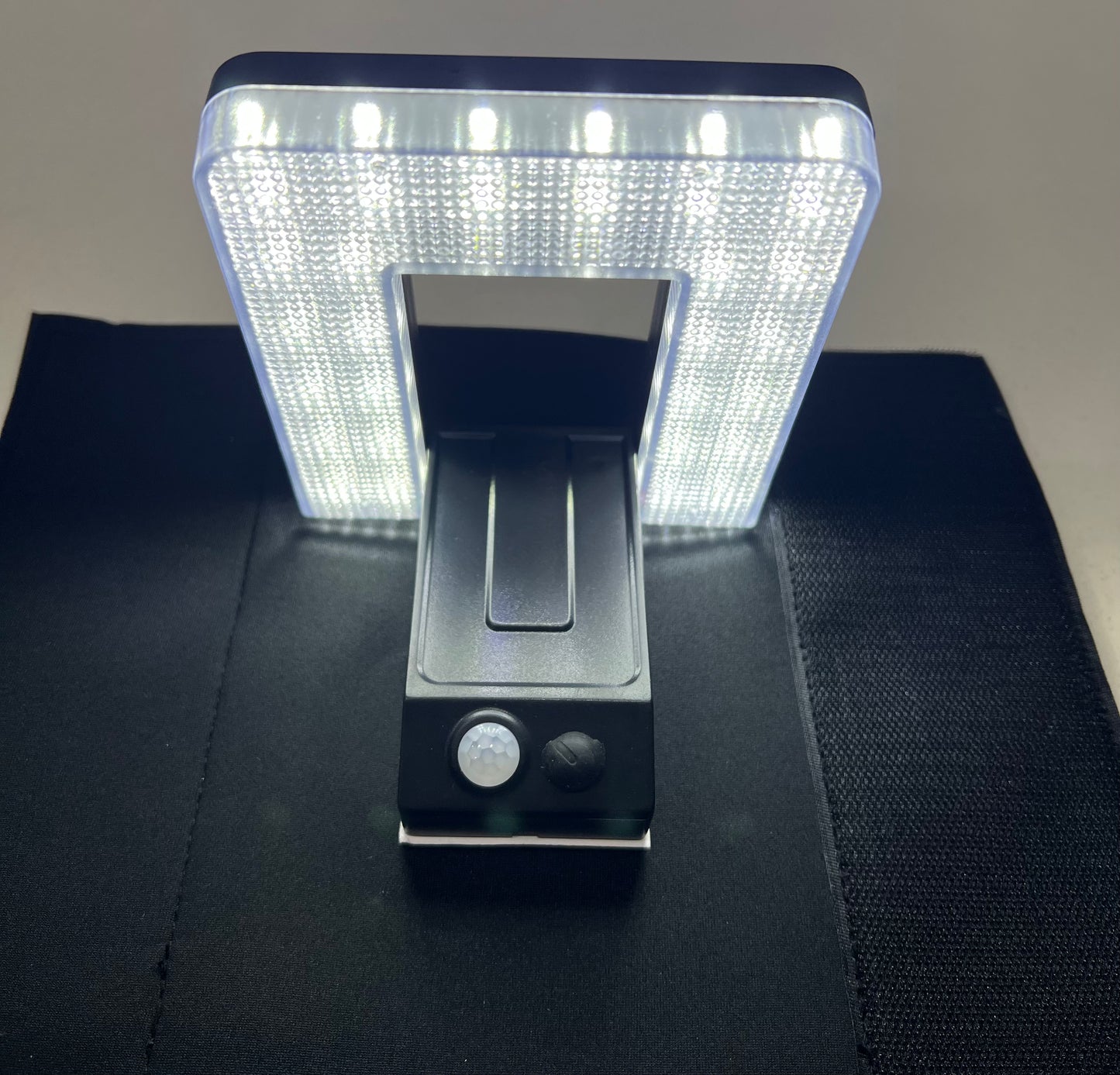SOLAR POWERED ADJUSTABLE FOLD FLAT LED LIGHTS