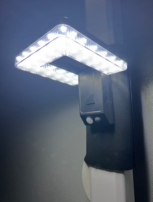 ULTIMATE NEOPRENE AWNING TIE DOWN STRAPS WITH BUILT IN SOLAR POWERED ADJUSTABLE FOLD FLAT LED LIGHTS