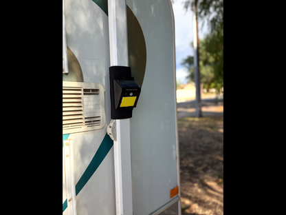 AWNING STRAP WITH BUILT IN SOLAR POWERED SUPER BRIGHT LIGHT